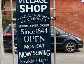 Traditional sign writing on sign